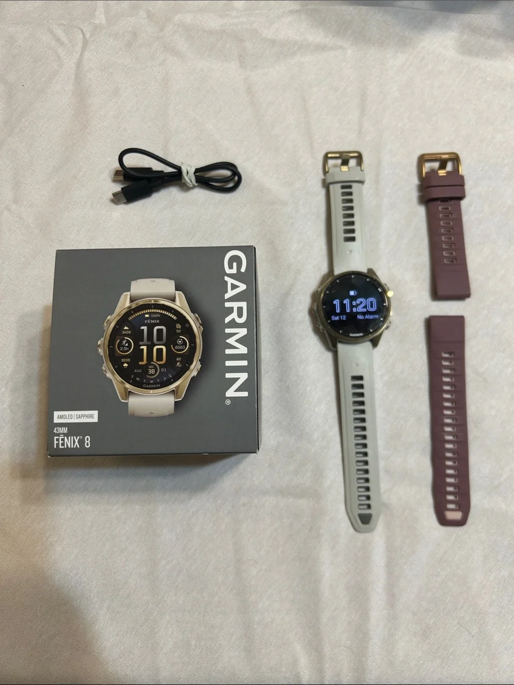 garmin Fenix 8 Smartwatch in Light Gray with Plum Bands
